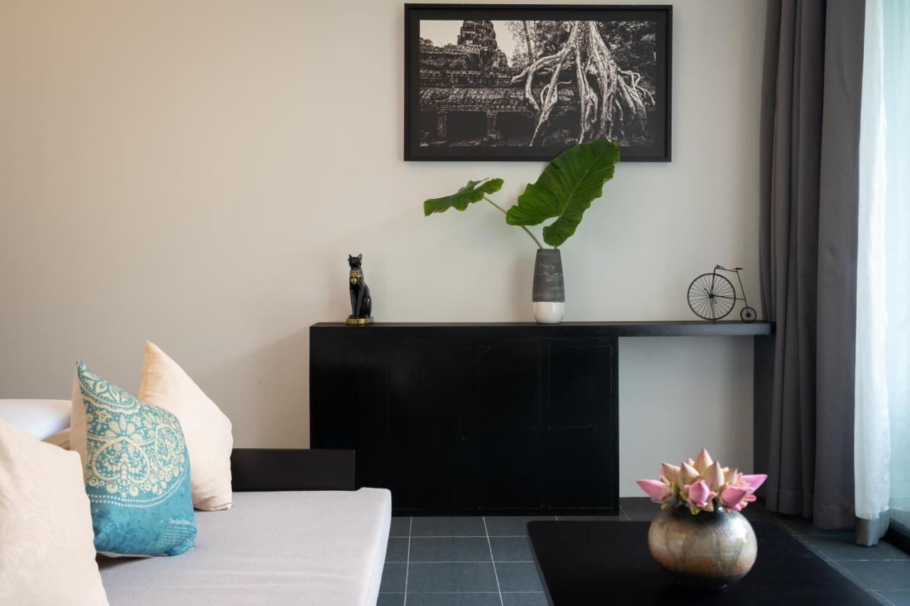 Eightfold Urban Resort Σιέμ Ρέαπ Εξωτερικό φωτογραφία A living room in a modern house