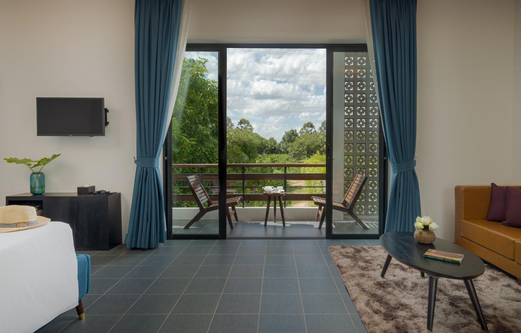 Eightfold Urban Resort Σιέμ Ρέαπ Δωμάτιο φωτογραφία Deluxe Room with private balcony